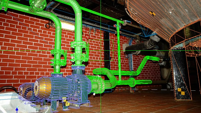 Photograph overlaid with a 3D model of the pump connection to a whisky still